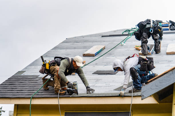 Professional Gutter Installation technician working in Claremont, CA